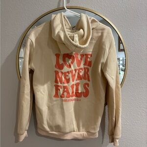 Cream Hoodie with Bold Red Text